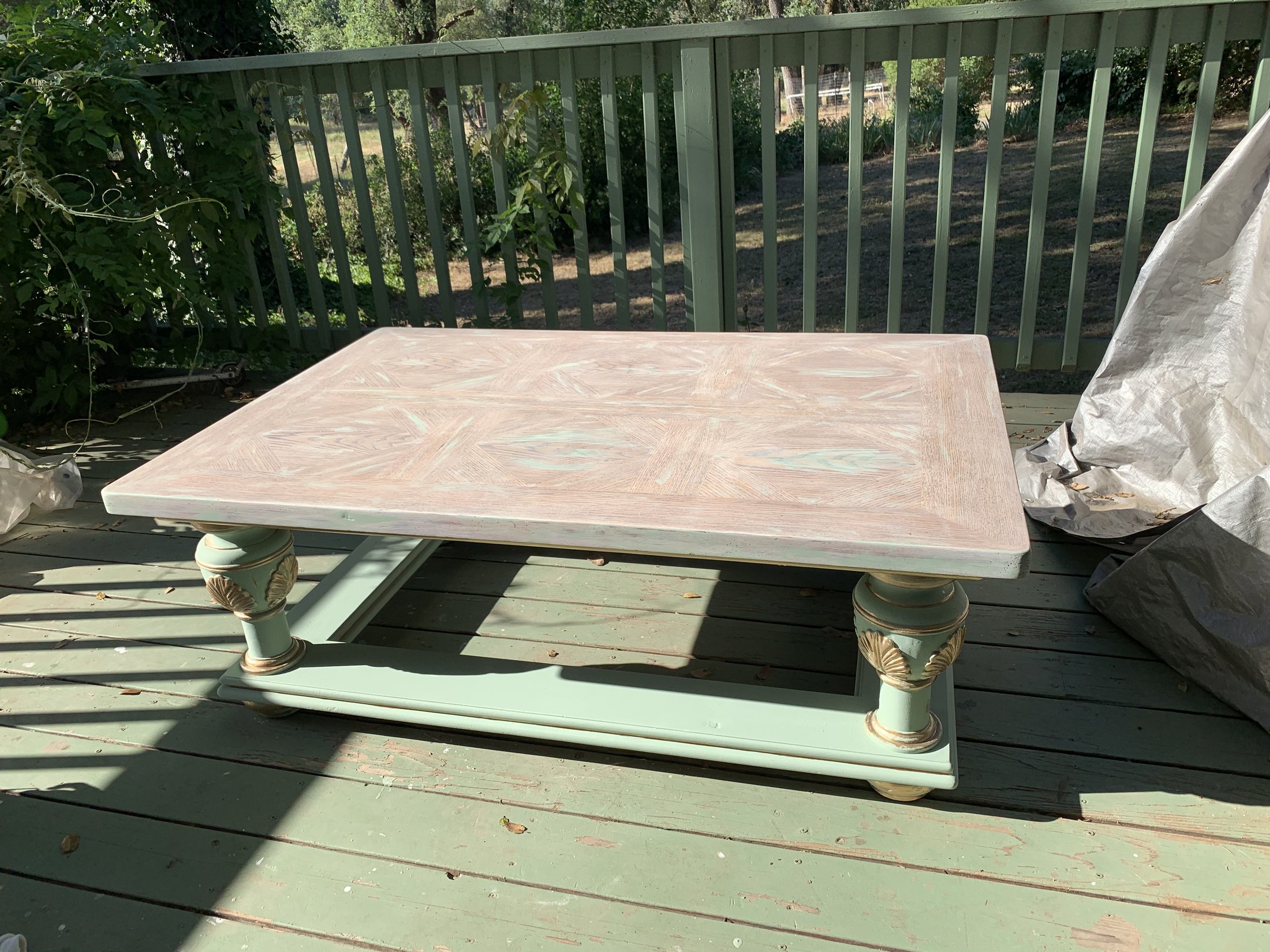 Green painted coffee table after its transformation