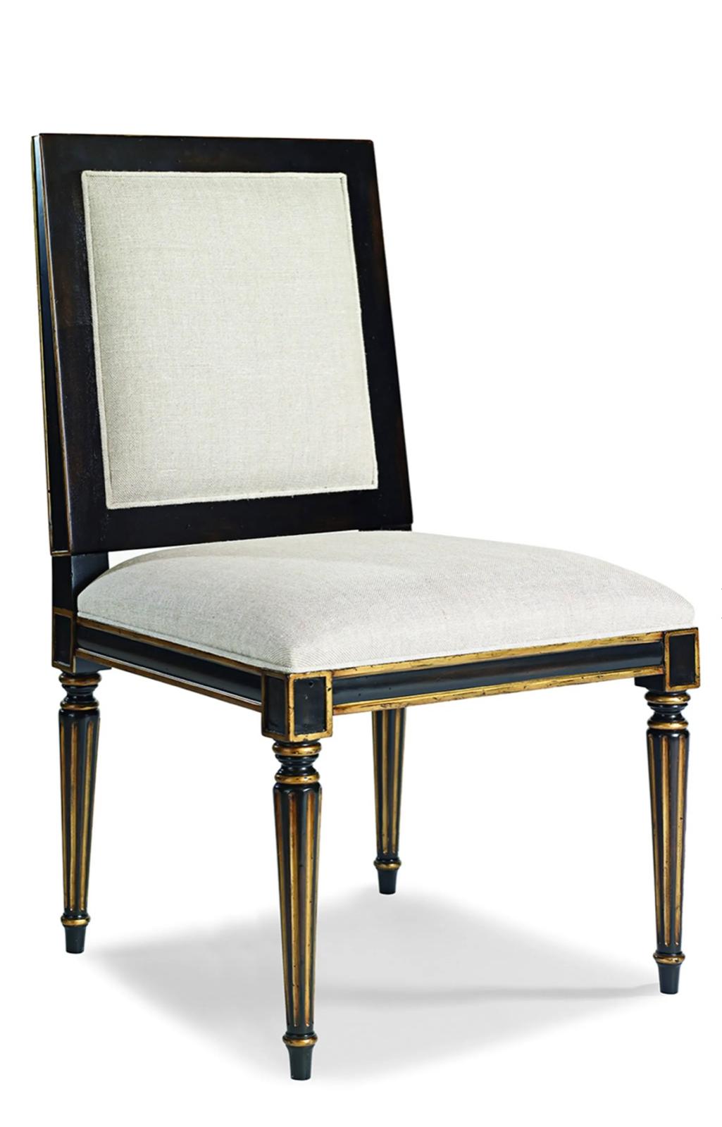 Black and gold classical chair used as a design reference