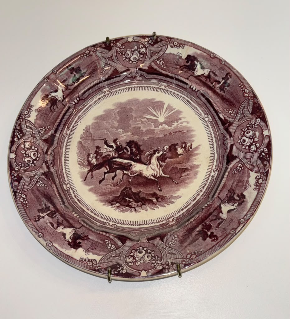Antique equestrian transferware plate in a deep purple tone