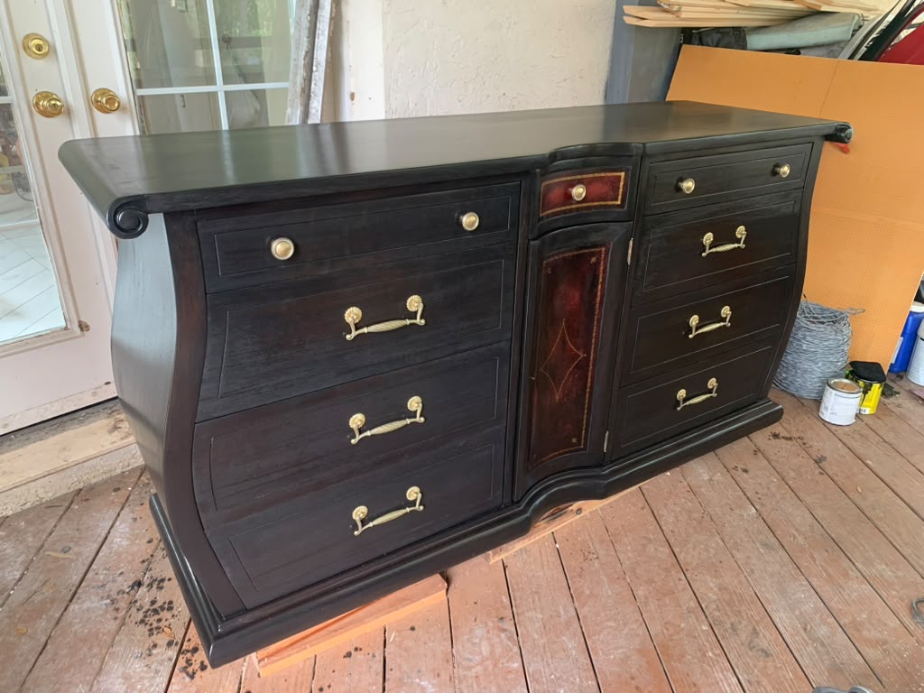 Sideboard restored with a deep black finish and cleaned brass hardware